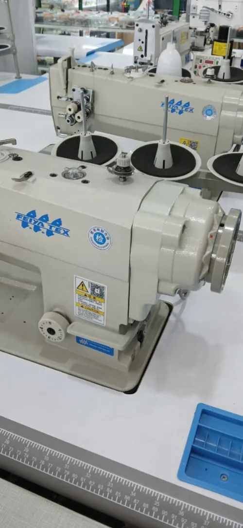 ماكينة الخياطة ثنائية الابر   machine double aiguille selencieuse feiya tex