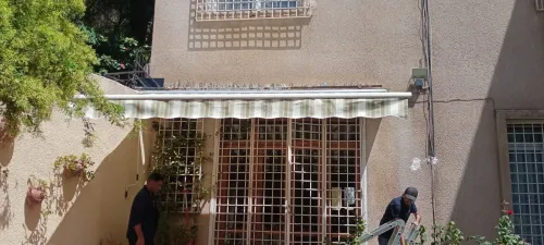 Tinda et bâche pour locaux et maison 