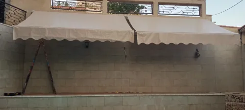 Tinda et bâche pour locaux et maison 