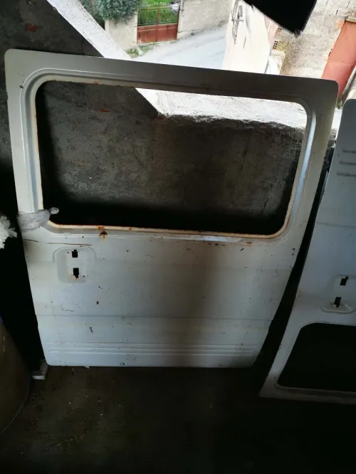 Porte la tiralle changue 2005