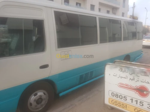 Location bus Toyota Coaster 