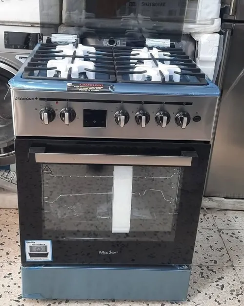 CUISINIÈRE MAXTOR PREMIUM + POWER WOK 4 FEUX INOX AVEC FOUR VENTILÉ ET CATALYSÉ / CASH ET FACILITÉ