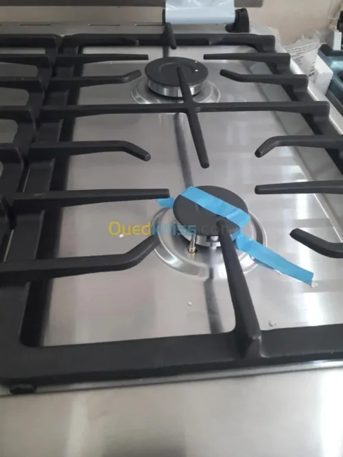 CUISINIÈRE MAXTOR PREMIUM + POWER WOK 4 FEUX INOX AVEC FOUR VENTILÉ ET CATALYSÉ / CASH ET FACILITÉ