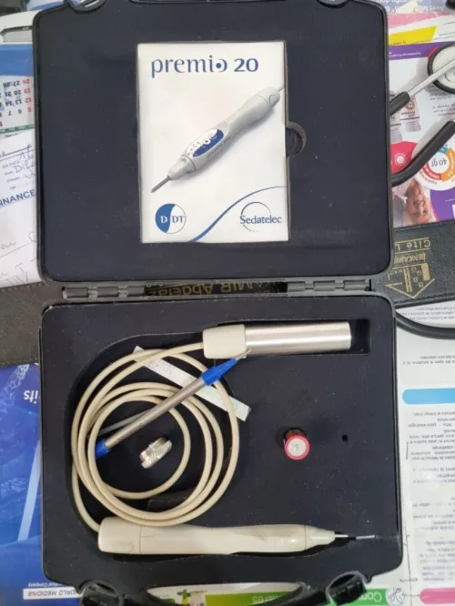 Detecteur de point d'accupuncture et d'auriculo (Sedatelec) + guide + pils de rechange
