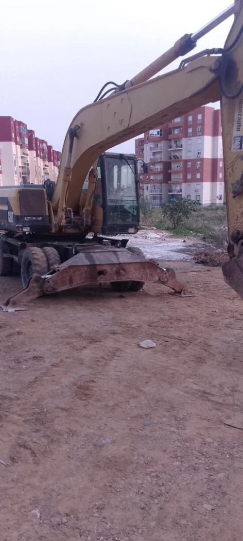 Hyundai Caterpillar M320 pneumatique 