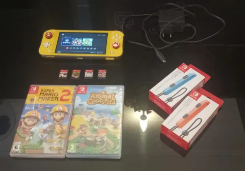 Nintendo Switch Lite + Accessoires + Jeux