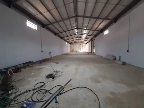 installation chemin de câble et éclairage pour hangar.