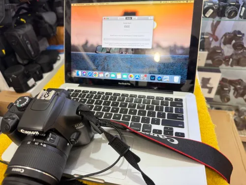 Canon 1100 D  668 clik