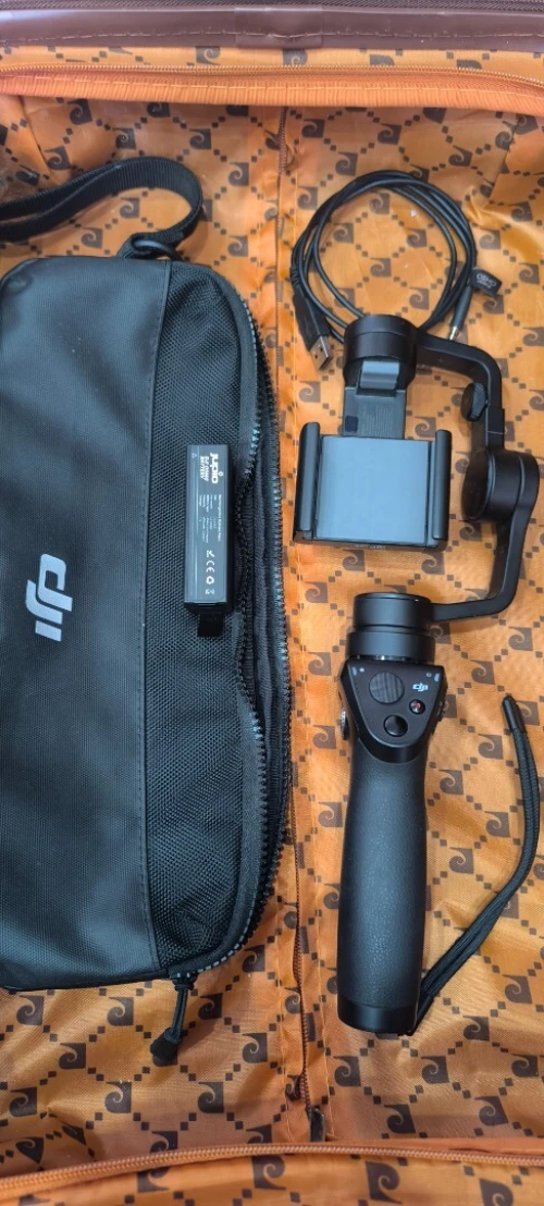 DJI osmo mobile original avec  batterie 