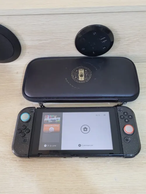 Nintendo Switch + 1 JEUX + PROTECTION TRANSPARENTE + POCHETTE