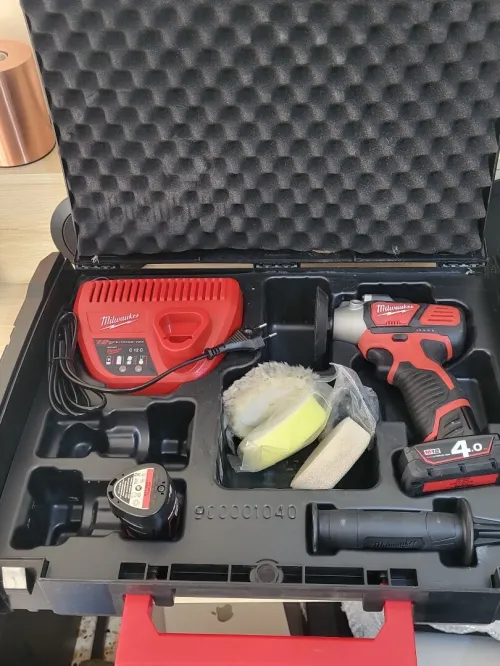 Milwaukee M12 BPS-421X - Set ponceuse polisseuse Li-Ion 12V (1x batterie 4.0Ah & 1x 2.0Ah) dans HD Box - NEUF JAMAIS UTILISÉ.