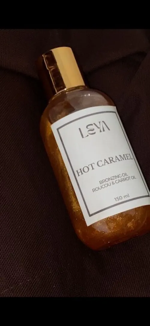 Huile bronzante à l'huile de carotte et roucou parfum vanille caramel | HOT CARAMEL