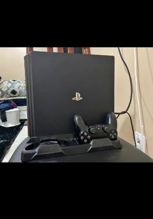 Ps4 pro jdida avec manette et tout les cabel et joux Fc 25 et version 13.02 et 500g