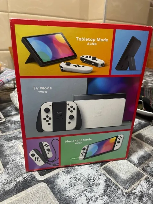 Nintendo switch oled flashé comme neuf avec touts accessoires
