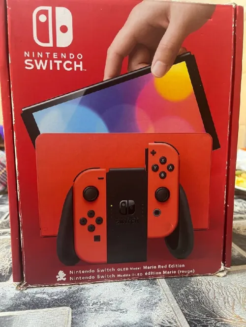 Nintendo switch OLED édition mario red excellent état