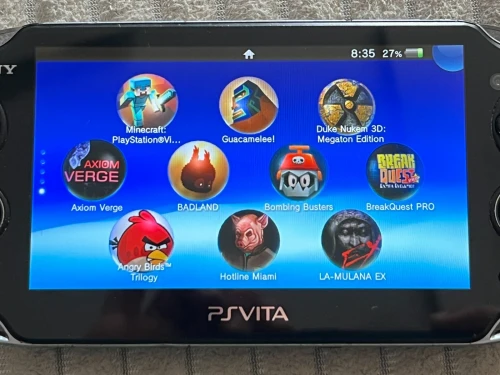 SONY PS VITA OLED Etat 10/10 64 Go + Flash et jeux