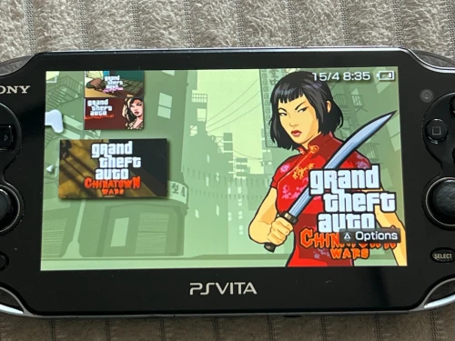 SONY PS VITA OLED Etat 10/10 64 Go + Flash et jeux