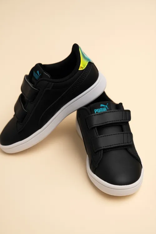 Vend une superbe paire de baskets Puma mixte fille et garcon