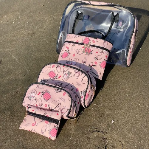 Sac de toilette 5 piéces rose avec  motifs