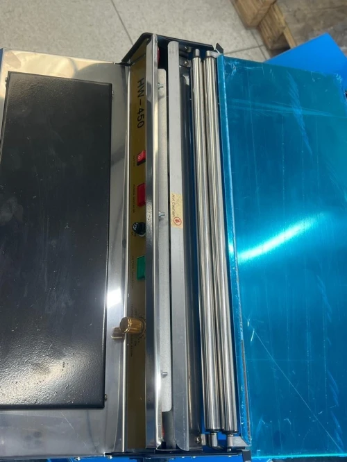 Filmeuse emballeuse à barquette manuelle HW-450