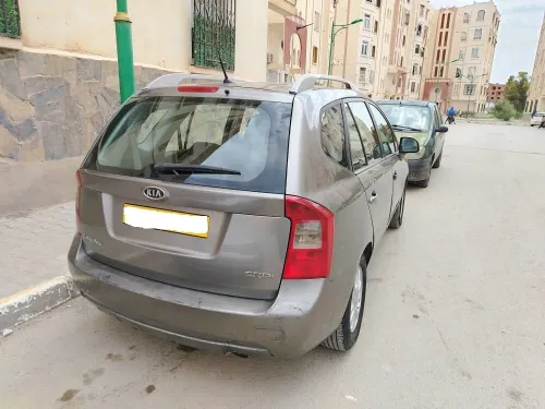 Kia Carens 2010 3 box
