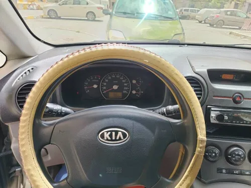 Kia Carens 2010 3 box