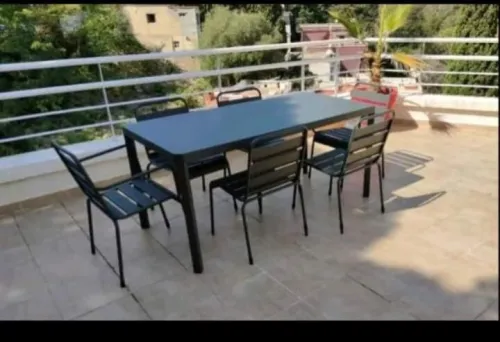 Table de jardin métallique inoxydable