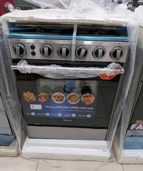 Cuisinière Midea 4 feux inox 60x60x85cm garantie 2 ans