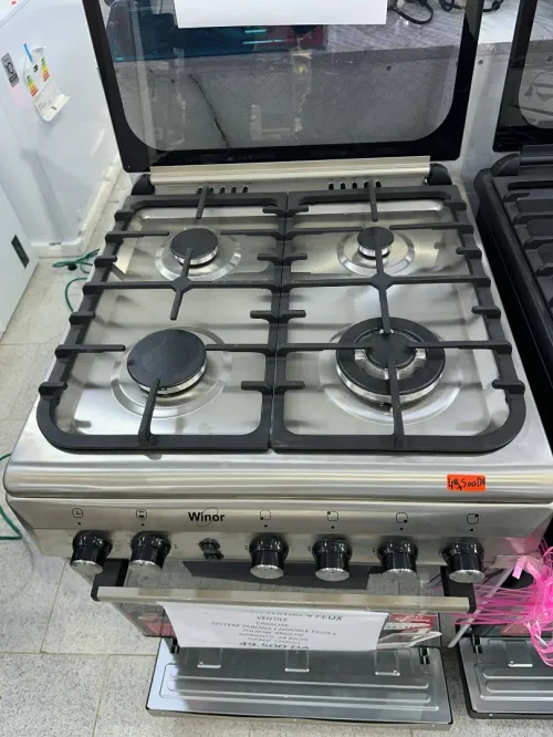 Cuisinière winor 4 feux Four ventilé inox 