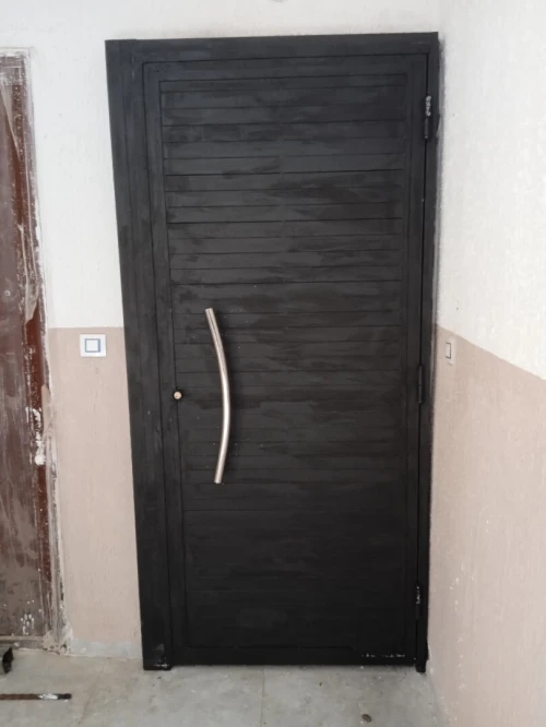 Barroudage et porte en fer forgé 