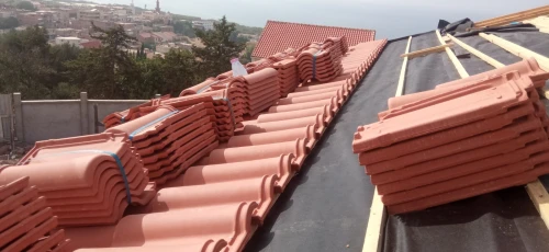 Travaux de tuile et charpente