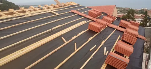 Travaux de tuile et charpente