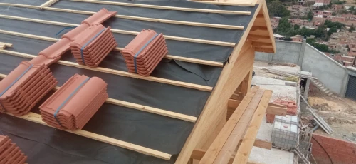 Travaux de tuile et charpente
