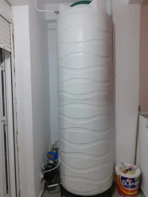 Installation climatiseur et citerne à eau