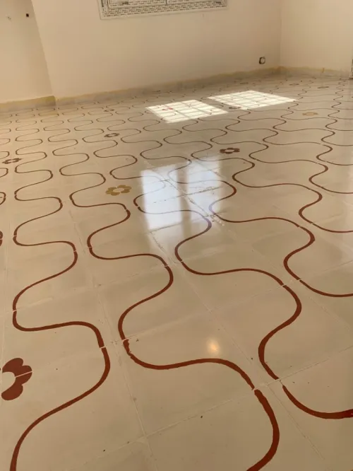 Poncage carrelage ciment 