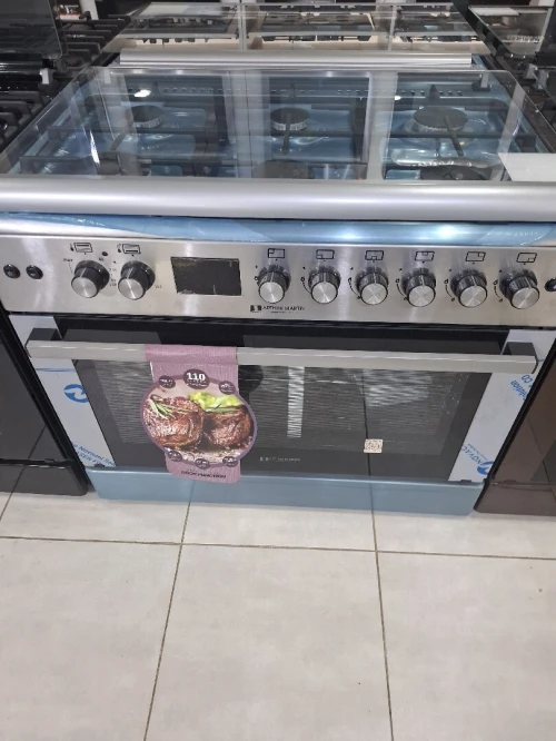 Cuisinière Arthur Martin  6 feux gaz electrique inox double wok