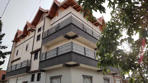 Facade en monocouch gratté et mouchter écrasé.......