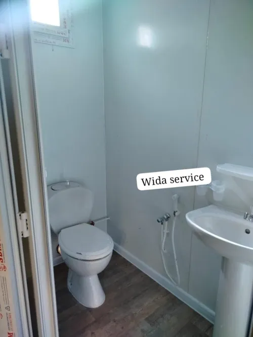 Cabine 9*3 avec sanitaire et douche