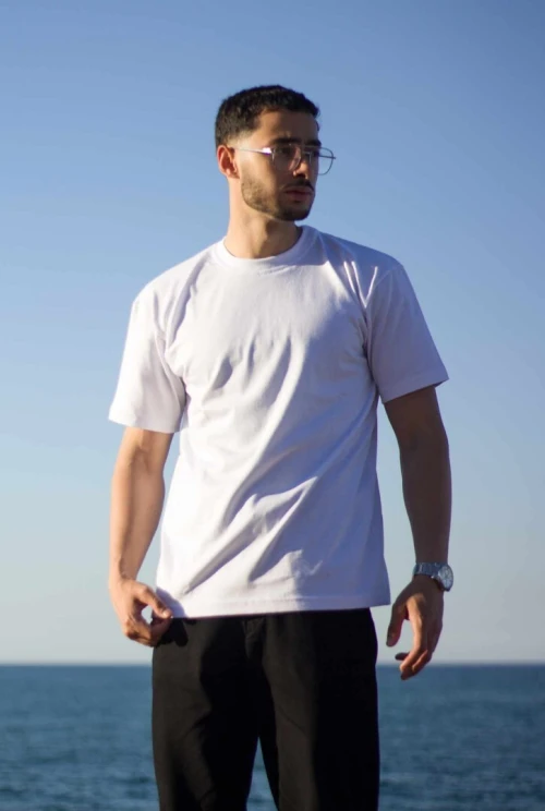 Tshirt Oversize 1  Tshirt = 1400 DA 2 Tshirts =2500  DA  ال num 