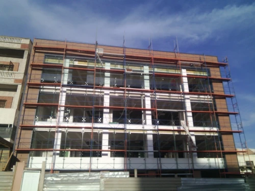 Revetemet de facade mur rideau . Hpl. Terre cuite