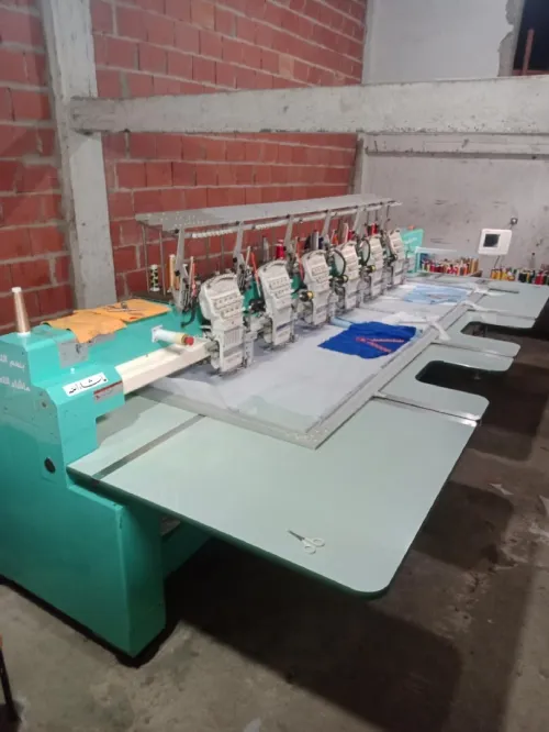 Machine à coudre 6 têtes 