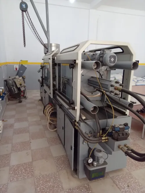 Machine injection plastique 200t 