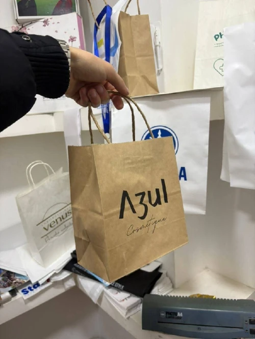 des sacs de shopping personalisés (sac en plastique, tnt , en carton ou en tissu )