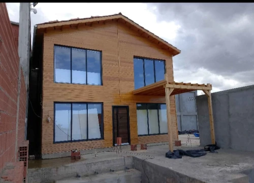 Construction des. Chalet bungalow en bois 