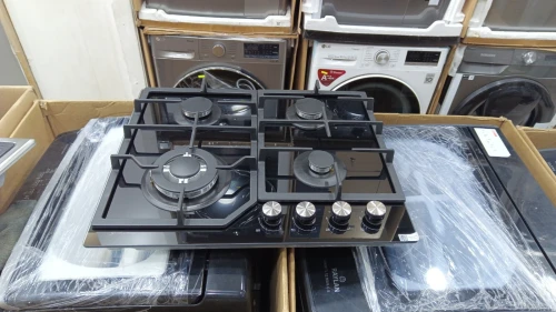 Promo plaque de cuisson tabouna wok schallenge-midea noir vitrocéramique 4 feux