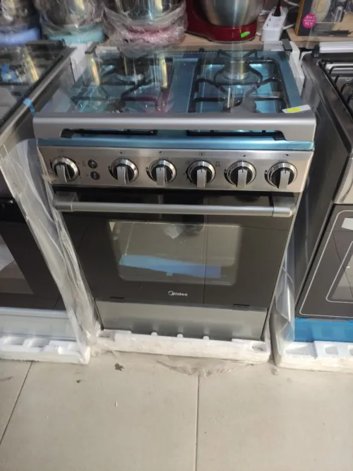 promo cuisinière midea inox 4 feux ventilé 