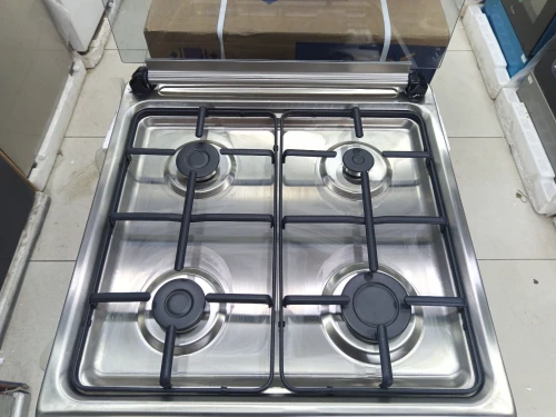 Promo cuisinière Schneider Gaz-électrique 4 feux ventilé inox fonte