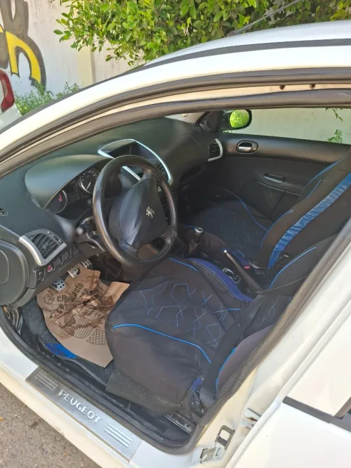 Peugeot 206 Plus 2012 generation