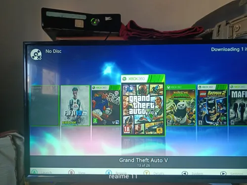 Xbox360slim + manette avec Fil + 23jeux (très bon état)