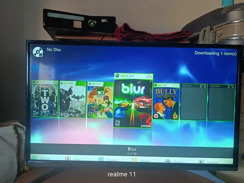 Xbox360slim + manette avec Fil + 23jeux (très bon état)